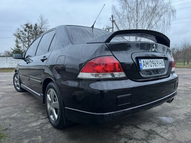 Чорний Міцубісі Lancer, об'ємом двигуна 1.6 л та пробігом 154 тис. км за 5500 $, фото 10 на Automoto.ua