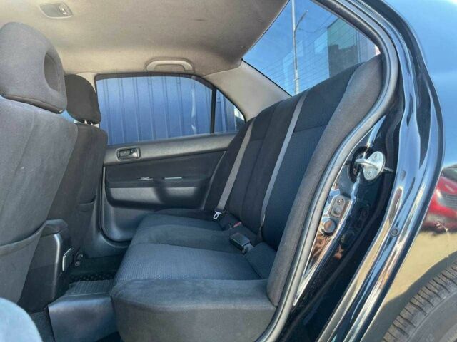 Чорний Міцубісі Lancer, об'ємом двигуна 2 л та пробігом 310 тис. км за 4990 $, фото 9 на Automoto.ua