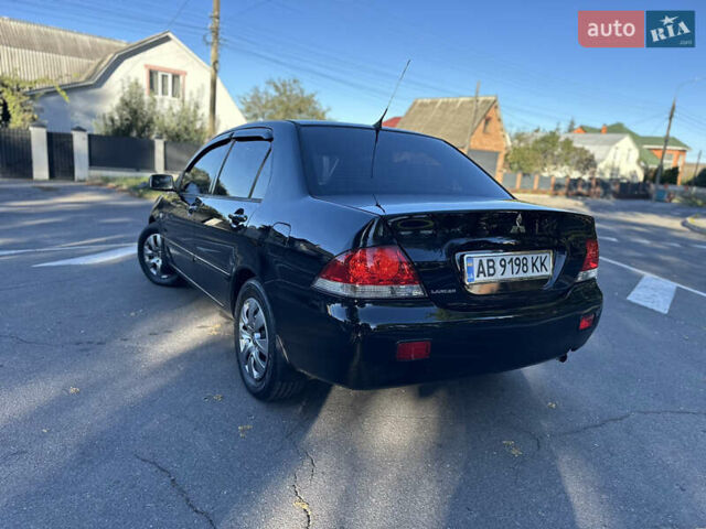 Мицубиси Лансер 2005 в Виннице на Automoto.ua Черный Мицубиси Лансер, объемом двигателя 1.6 л и пробегом 261 тыс. км за 4100 $, фото 21 на Automoto.ua
