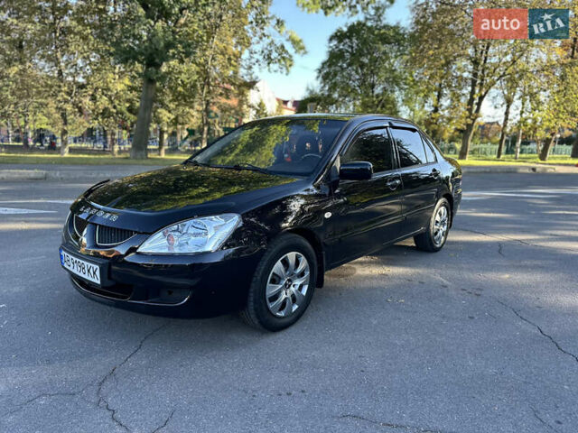 Мицубиси Лансер 2005 в Виннице на Automoto.ua Черный Мицубиси Лансер, объемом двигателя 1.6 л и пробегом 261 тыс. км за 4100 $, фото 27 на Automoto.ua