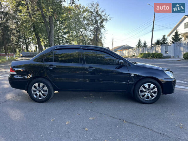 Мицубиси Лансер 2005 в Виннице на Automoto.ua Черный Мицубиси Лансер, объемом двигателя 1.6 л и пробегом 261 тыс. км за 4100 $, фото 31 на Automoto.ua