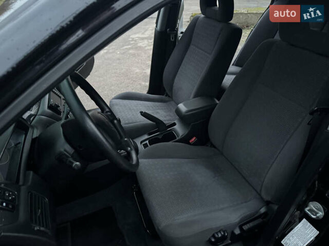 Черный Мицубиси Лансер, объемом двигателя 1.58 л и пробегом 154 тыс. км за 5500 $, фото 27 на Automoto.ua