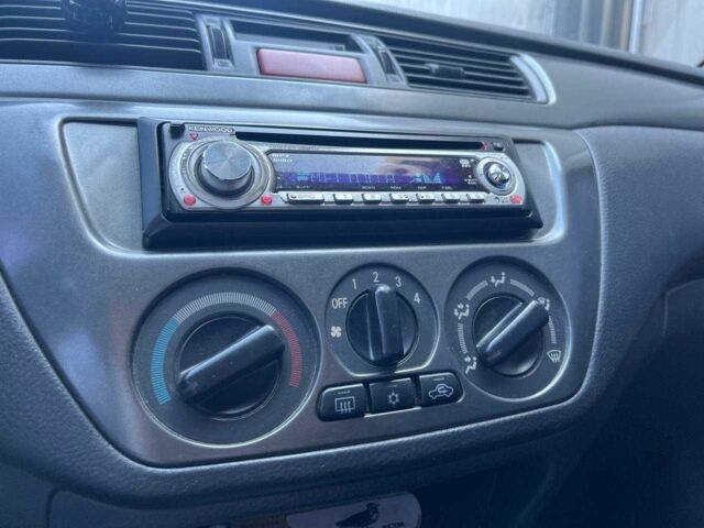 Чорний Міцубісі Lancer, об'ємом двигуна 2 л та пробігом 310 тис. км за 4990 $, фото 23 на Automoto.ua