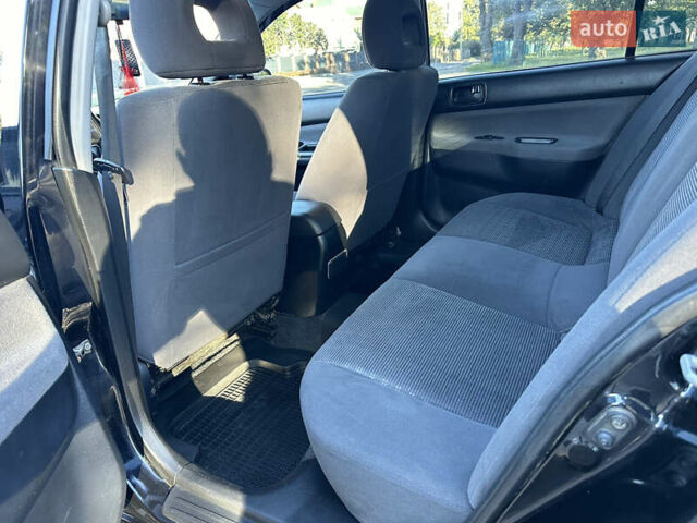 Мицубиси Лансер 2005 в Виннице на Automoto.ua Черный Мицубиси Лансер, объемом двигателя 1.6 л и пробегом 261 тыс. км за 4100 $, фото 42 на Automoto.ua