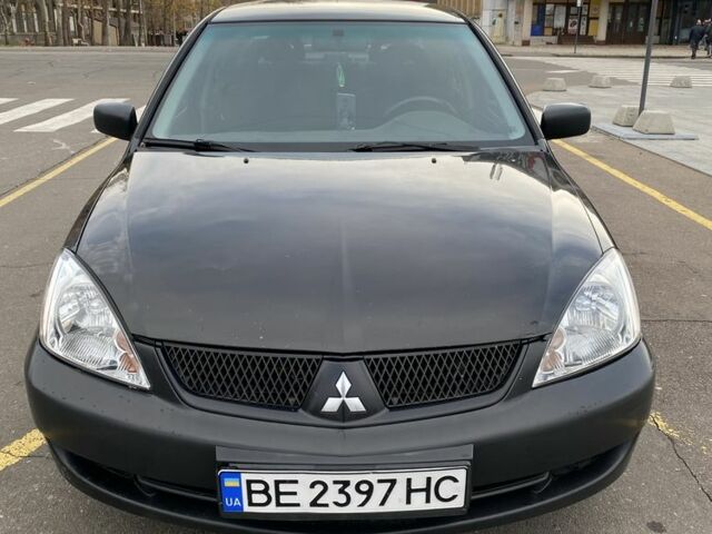 Черный Мицубиси Лансер, объемом двигателя 1.6 л и пробегом 350 тыс. км за 2900 $, фото 3 на Automoto.ua