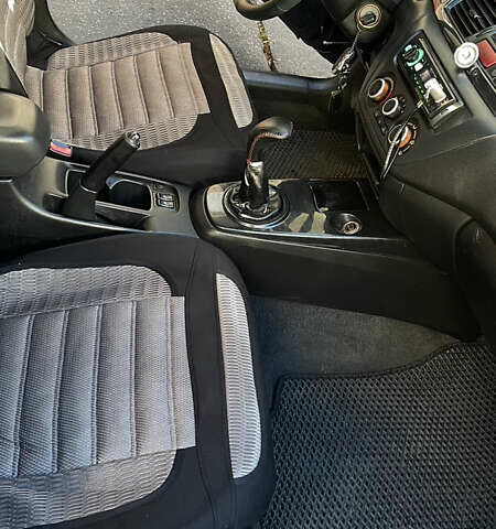 Черный Мицубиси Лансер, объемом двигателя 1.6 л и пробегом 200 тыс. км за 3000 $, фото 6 на Automoto.ua