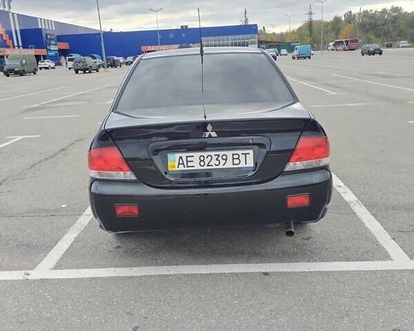 Міцубісі Lancer 2005 у Запоріжжя на Automoto.ua Чорний Міцубісі Lancer, об'ємом двигуна 1.58 л та пробігом 186 тис. км за 4700 $, фото 2 на Automoto.ua