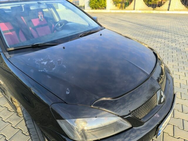 Чорний Міцубісі Lancer, об'ємом двигуна 2 л та пробігом 261 тис. км за 2700 $, фото 7 на Automoto.ua