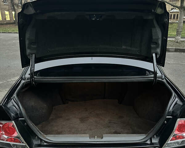 Чорний Міцубісі Lancer, об'ємом двигуна 2 л та пробігом 250 тис. км за 3999 $, фото 14 на Automoto.ua