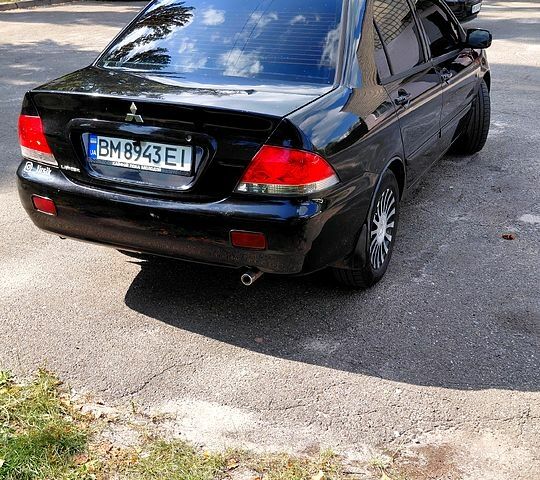Чорний Міцубісі Lancer, об'ємом двигуна 1.6 л та пробігом 0 тис. км за 4100 $, фото 2 на Automoto.ua