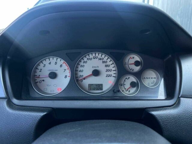 Чорний Міцубісі Lancer, об'ємом двигуна 2 л та пробігом 310 тис. км за 4990 $, фото 19 на Automoto.ua