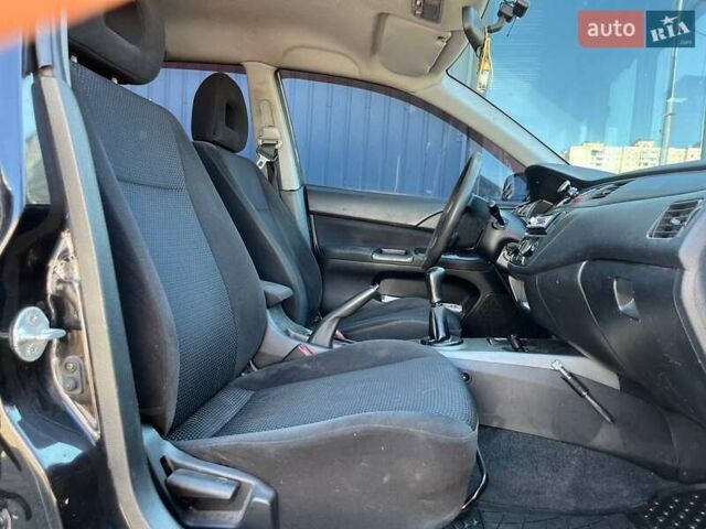 Черный Мицубиси Лансер, объемом двигателя 1.58 л и пробегом 310 тыс. км за 5690 $, фото 11 на Automoto.ua