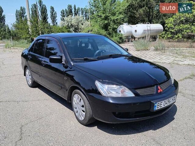 Черный Мицубиси Лансер, объемом двигателя 1.58 л и пробегом 352 тыс. км за 4000 $, фото 5 на Automoto.ua