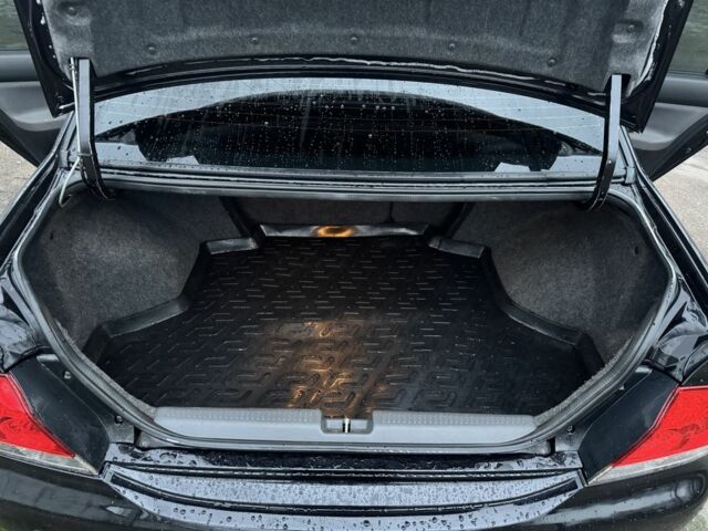 Чорний Міцубісі Lancer, об'ємом двигуна 1.6 л та пробігом 154 тис. км за 5500 $, фото 13 на Automoto.ua