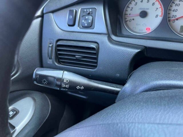 Чорний Міцубісі Lancer, об'ємом двигуна 2 л та пробігом 310 тис. км за 4990 $, фото 18 на Automoto.ua