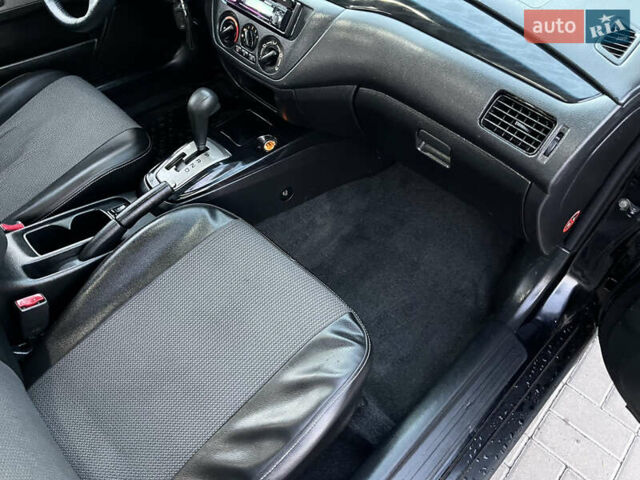 Мицубиси Лансер 2005 в Черкассах на Automoto.ua Черный Мицубиси Лансер, объемом двигателя 1.58 л и пробегом 368 тыс. км за 4400 $, фото 28 на Automoto.ua