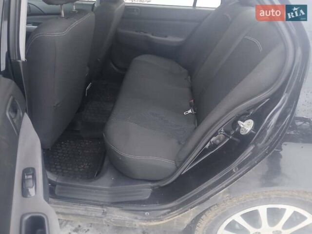 Чорний Міцубісі Lancer, об'ємом двигуна 1.6 л та пробігом 275 тис. км за 2999 $, фото 11 на Automoto.ua