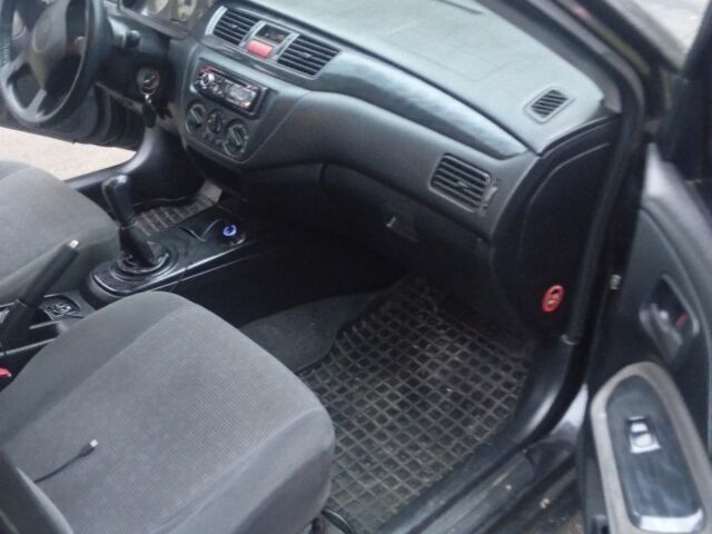 Чорний Міцубісі Lancer, об'ємом двигуна 1.6 л та пробігом 211 тис. км за 3700 $, фото 2 на Automoto.ua
