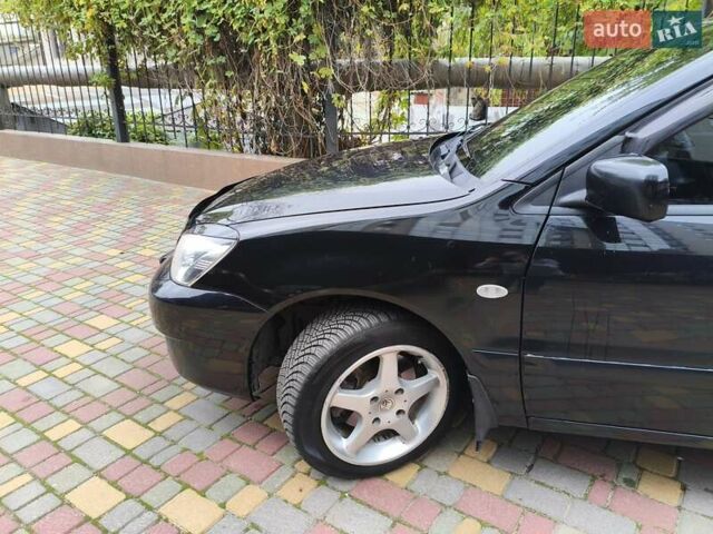 Мицубиси Лансер 2005 в Одессе на Automoto.ua Черный Мицубиси Лансер, объемом двигателя 1.58 л и пробегом 206 тыс. км за 3900 $, фото 1 на Automoto.ua