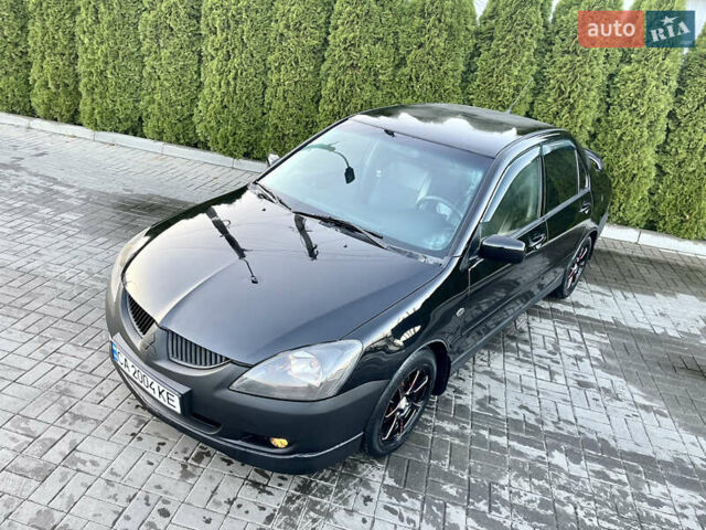 Мицубиси Лансер 2005 в Черкассах на Automoto.ua Черный Мицубиси Лансер, объемом двигателя 1.58 л и пробегом 368 тыс. км за 4400 $, фото 8 на Automoto.ua