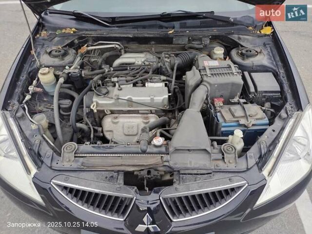 Міцубісі Lancer 2005 у Запоріжжя на Automoto.ua Чорний Міцубісі Lancer, об'ємом двигуна 1.58 л та пробігом 186 тис. км за 4700 $, фото 8 на Automoto.ua