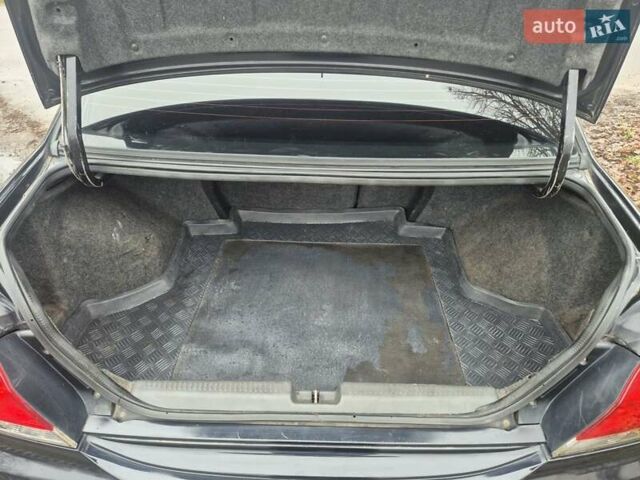 Черный Мицубиси Лансер, объемом двигателя 1.58 л и пробегом 280 тыс. км за 3200 $, фото 13 на Automoto.ua