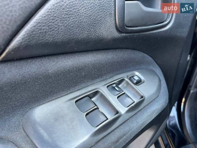 Черный Мицубиси Лансер, объемом двигателя 1.58 л и пробегом 310 тыс. км за 5690 $, фото 15 на Automoto.ua