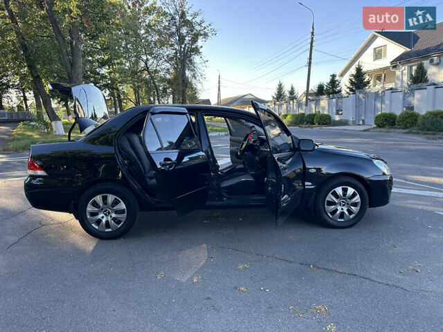 Мицубиси Лансер 2005 в Виннице на Automoto.ua Черный Мицубиси Лансер, объемом двигателя 1.6 л и пробегом 261 тыс. км за 4100 $, фото 60 на Automoto.ua
