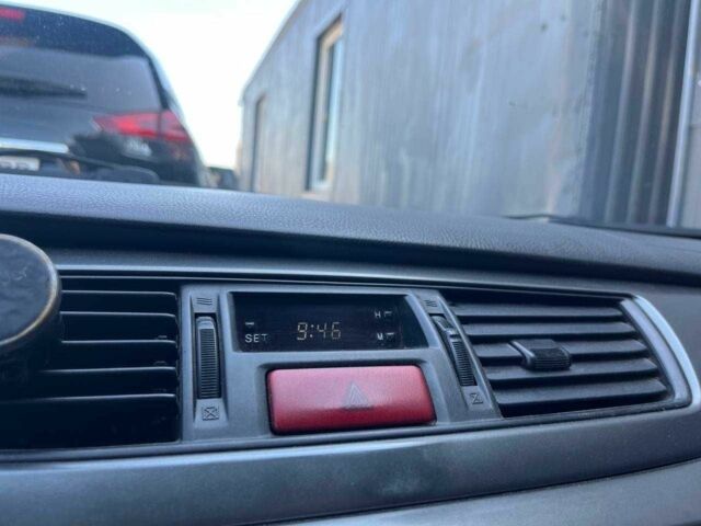 Чорний Міцубісі Lancer, об'ємом двигуна 2 л та пробігом 310 тис. км за 4990 $, фото 22 на Automoto.ua