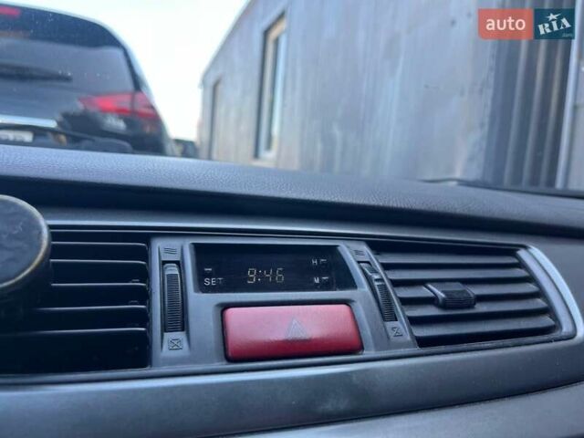 Черный Мицубиси Лансер, объемом двигателя 1.58 л и пробегом 310 тыс. км за 5690 $, фото 22 на Automoto.ua