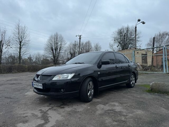 Чорний Міцубісі Lancer, об'ємом двигуна 1.6 л та пробігом 154 тис. км за 5500 $, фото 3 на Automoto.ua