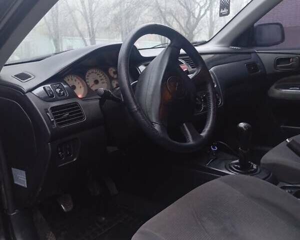 Чорний Міцубісі Lancer, об'ємом двигуна 1.6 л та пробігом 211 тис. км за 3700 $, фото 3 на Automoto.ua
