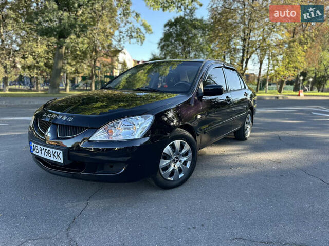 Мицубиси Лансер 2005 в Виннице на Automoto.ua Черный Мицубиси Лансер, объемом двигателя 1.6 л и пробегом 261 тыс. км за 4100 $, фото 4 на Automoto.ua