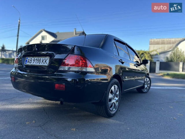 Мицубиси Лансер 2005 в Виннице на Automoto.ua Черный Мицубиси Лансер, объемом двигателя 1.6 л и пробегом 261 тыс. км за 4100 $, фото 13 на Automoto.ua