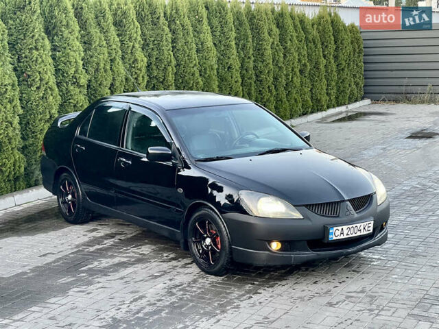 Мицубиси Лансер 2005 в Черкассах на Automoto.ua Черный Мицубиси Лансер, объемом двигателя 1.58 л и пробегом 368 тыс. км за 4400 $, фото 11 на Automoto.ua