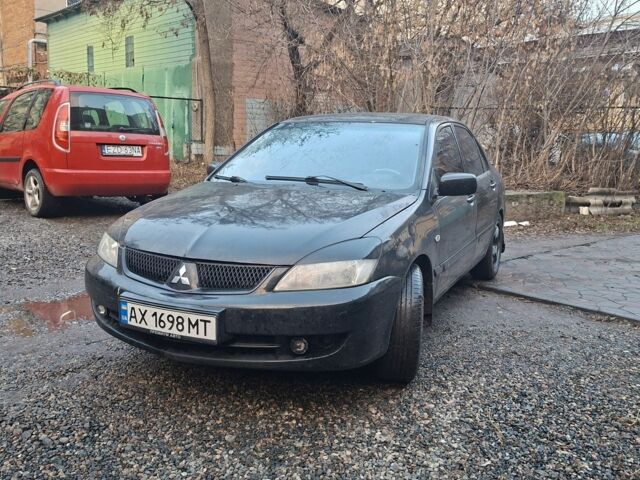 Чорний Міцубісі Lancer, об'ємом двигуна 1.6 л та пробігом 290 тис. км за 3800 $, фото 3 на Automoto.ua