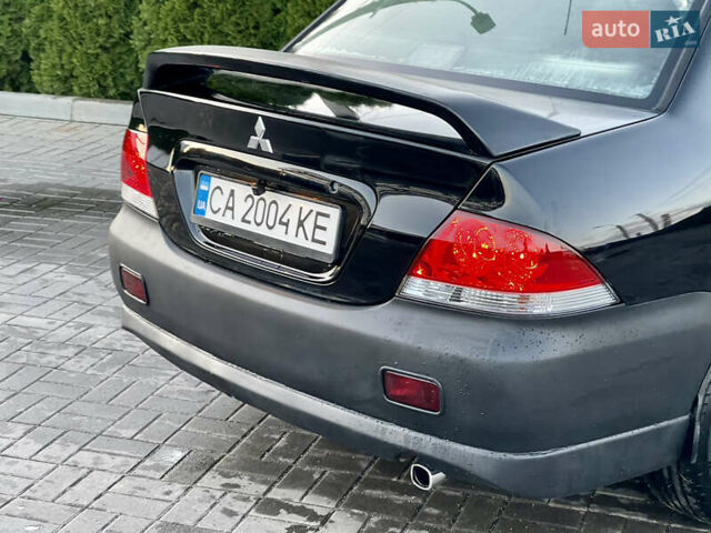 Мицубиси Лансер 2005 в Черкассах на Automoto.ua Черный Мицубиси Лансер, объемом двигателя 1.58 л и пробегом 368 тыс. км за 4400 $, фото 22 на Automoto.ua