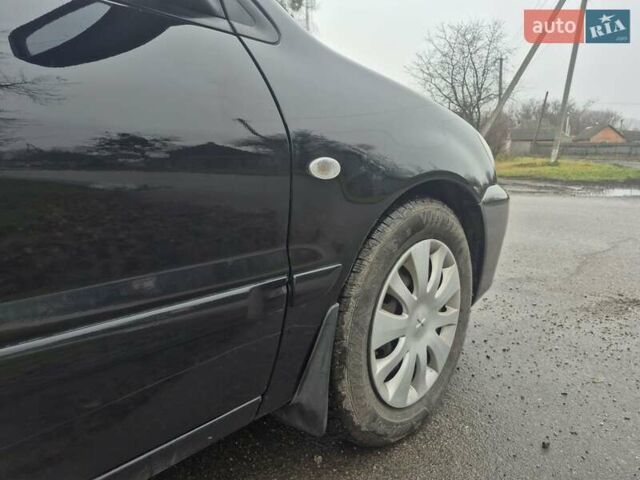 Черный Мицубиси Лансер, объемом двигателя 1.58 л и пробегом 280 тыс. км за 3200 $, фото 7 на Automoto.ua