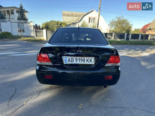 Мицубиси Лансер 2005 в Виннице на Automoto.ua Черный Мицубиси Лансер, объемом двигателя 1.6 л и пробегом 261 тыс. км за 4100 $, фото 7 на Automoto.ua