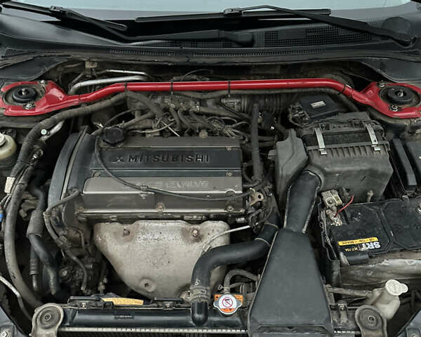 Чорний Міцубісі Lancer, об'ємом двигуна 2 л та пробігом 250 тис. км за 3999 $, фото 15 на Automoto.ua