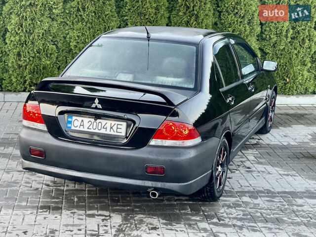 Мицубиси Лансер 2005 в Черкассах на Automoto.ua Черный Мицубиси Лансер, объемом двигателя 1.58 л и пробегом 368 тыс. км за 4400 $, фото 15 на Automoto.ua