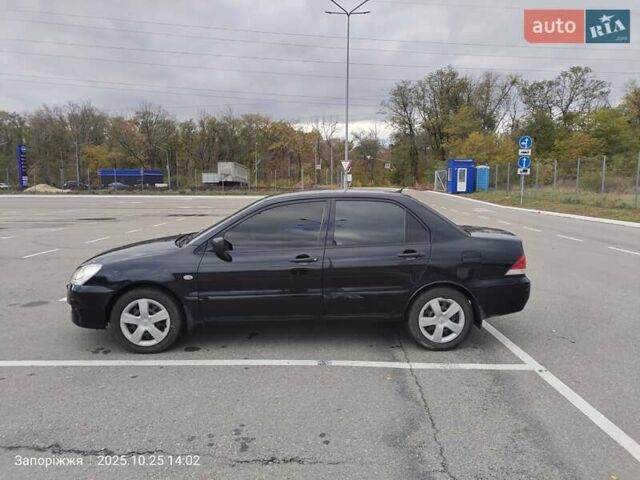 Міцубісі Lancer 2005 у Запоріжжя на Automoto.ua Чорний Міцубісі Lancer, об'ємом двигуна 1.58 л та пробігом 186 тис. км за 4700 $, фото 3 на Automoto.ua