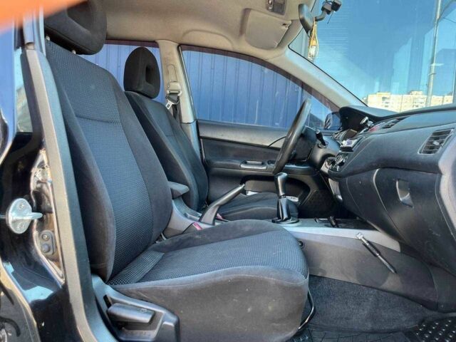 Чорний Міцубісі Lancer, об'ємом двигуна 2 л та пробігом 310 тис. км за 4990 $, фото 11 на Automoto.ua