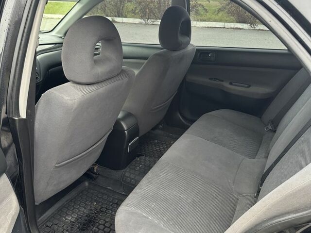 Черный Мицубиси Лансер, объемом двигателя 1.6 л и пробегом 200 тыс. км за 3500 $, фото 14 на Automoto.ua