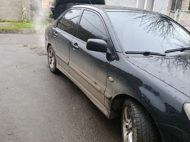 Черный Мицубиси Лансер, объемом двигателя 2 л и пробегом 275 тыс. км за 2599 $, фото 1 на Automoto.ua