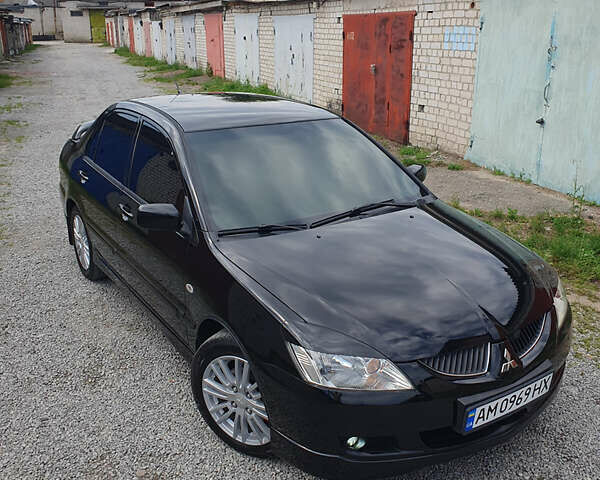 Черный Мицубиси Лансер, объемом двигателя 1.58 л и пробегом 154 тыс. км за 5500 $, фото 45 на Automoto.ua