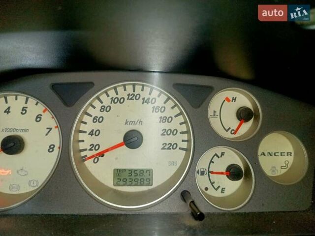 Чорний Міцубісі Lancer, об'ємом двигуна 1.58 л та пробігом 294 тис. км за 3800 $, фото 8 на Automoto.ua