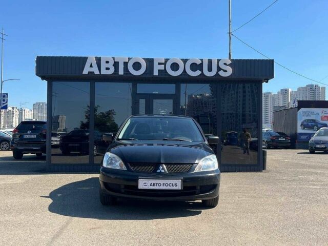 Чорний Міцубісі Lancer, об'ємом двигуна 2 л та пробігом 310 тис. км за 4990 $, фото 2 на Automoto.ua