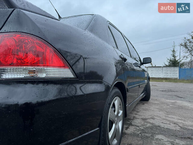 Черный Мицубиси Лансер, объемом двигателя 1.58 л и пробегом 154 тыс. км за 5500 $, фото 15 на Automoto.ua