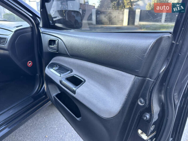 Мицубиси Лансер 2005 в Виннице на Automoto.ua Черный Мицубиси Лансер, объемом двигателя 1.6 л и пробегом 261 тыс. км за 4100 $, фото 49 на Automoto.ua